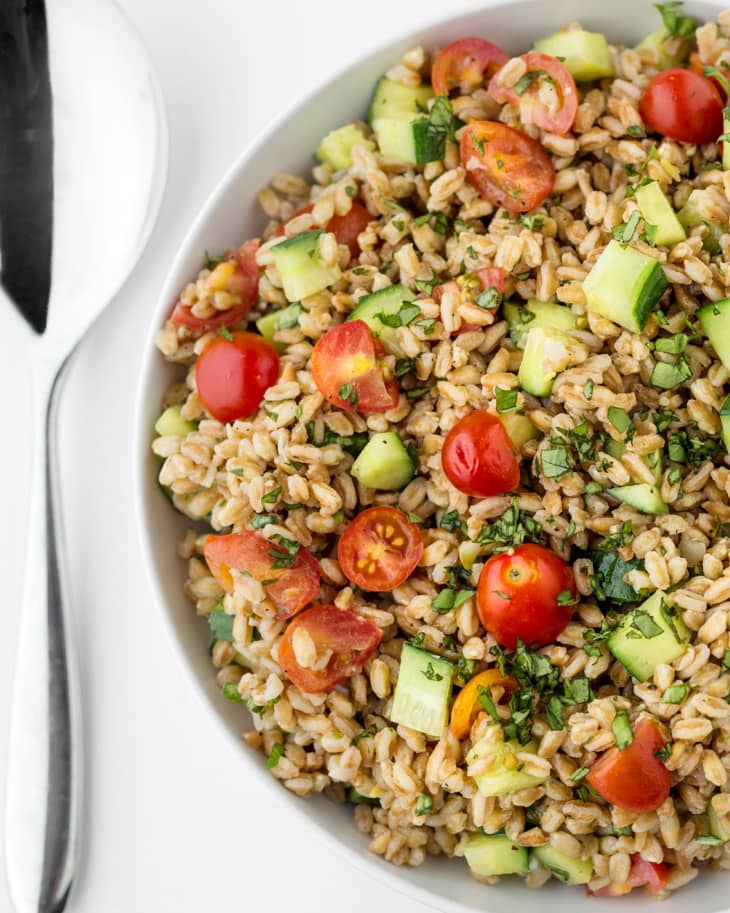 Satisfying Summer Salad Recipes I Farro Tomato and Cucumber Recipe by The Kitchn #saladrecipes