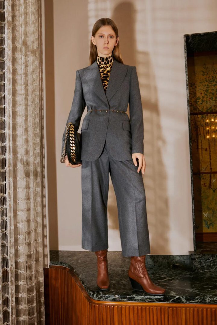 Stella McCartney Pre-Fall 2022 Collection Look 17 I Animal print body suit, fitted gray blazer, wide-leg sourced trousers #fashionstyle #ootdstyle