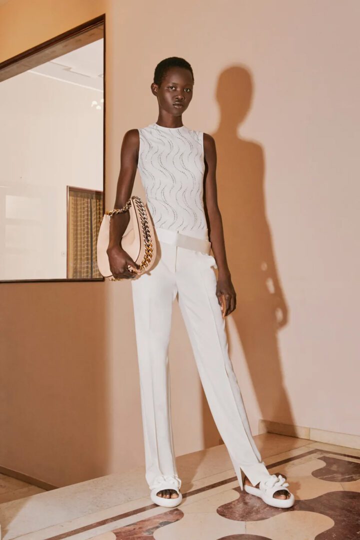 Stella McCartney Pre-Fall 2020 Collection I Cream Tank and Trousers with oversized chained faux-leather handbag #fashionstyle #ootdstyle