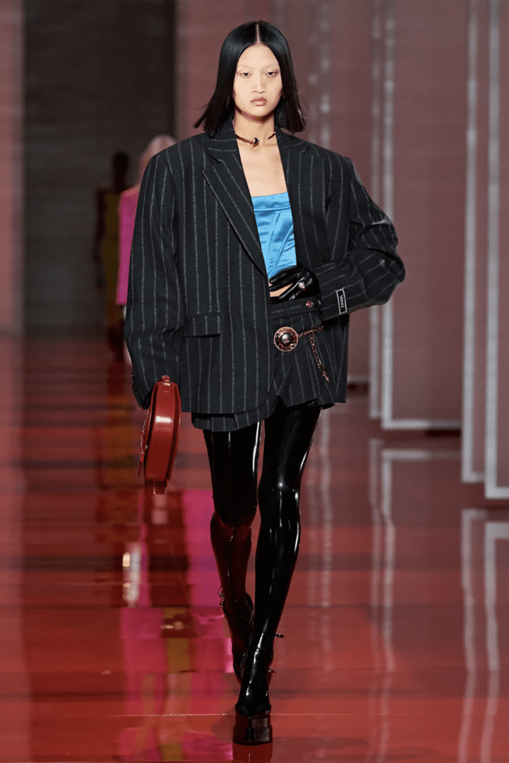 Versace Fall 2022 Collection I Oversized Pinstripe Blazer Jacket with Pleated Mini Skirt and latex Leggings #fashionstyle #ootdstyle