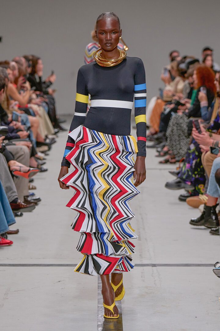 Best MFW Spring 2025 Looks of the Runway I Geometric accordion maxi skirt with striped crewneck 